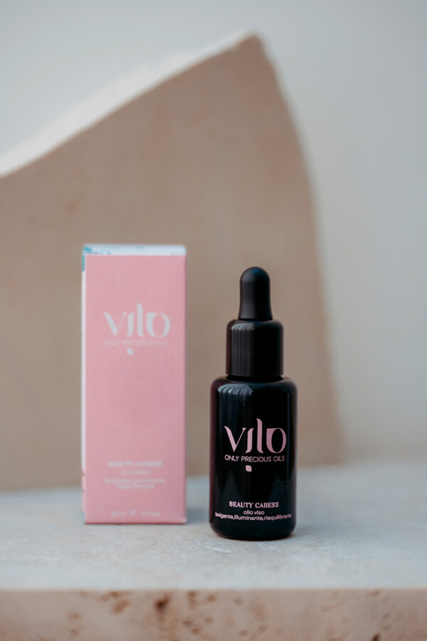 Foto di boccetto e packaging di olio viso beauty caress da 30ml di vilo cosmetics